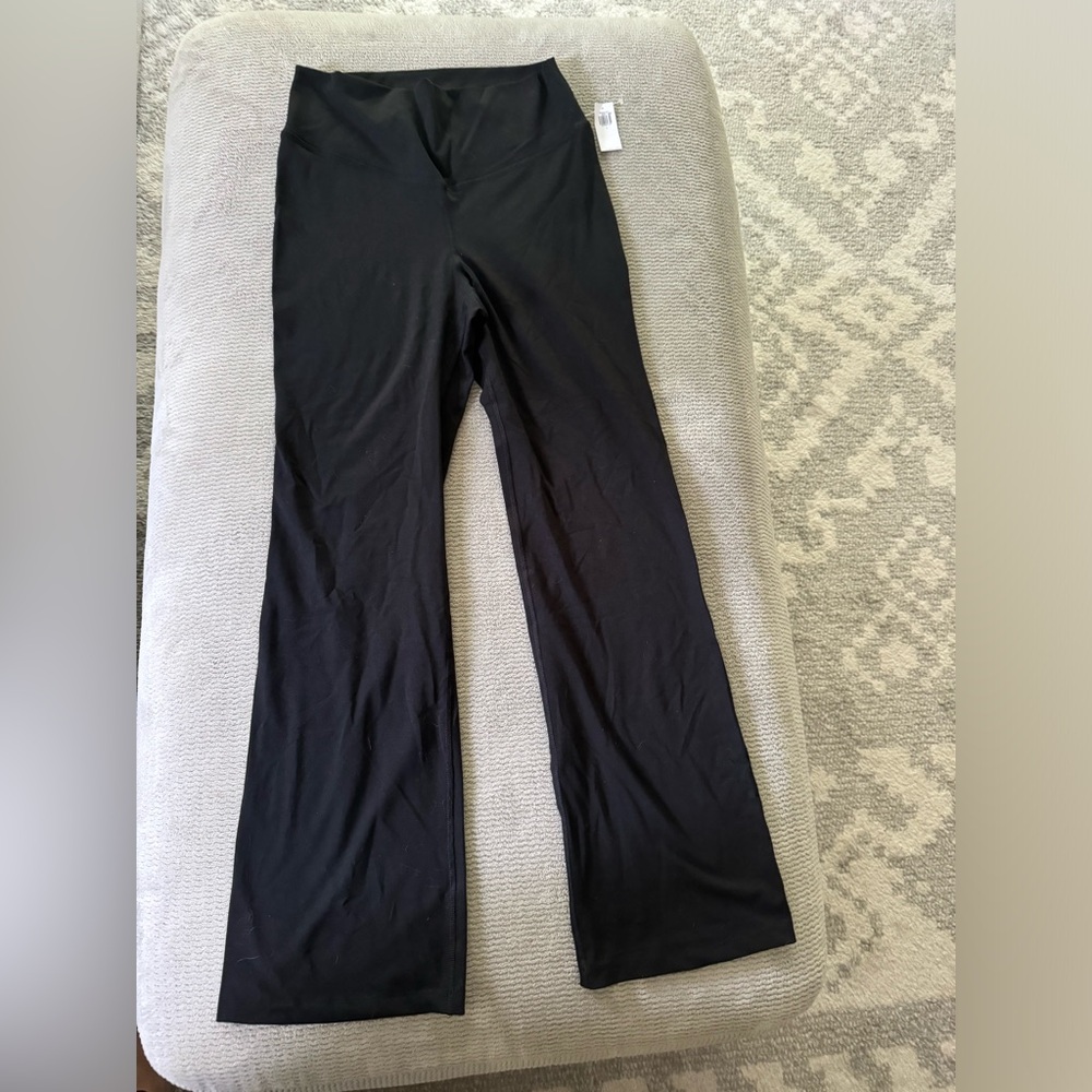 Brand new with tags Old Navy active pants. Black. Bootcut leg. Size L.